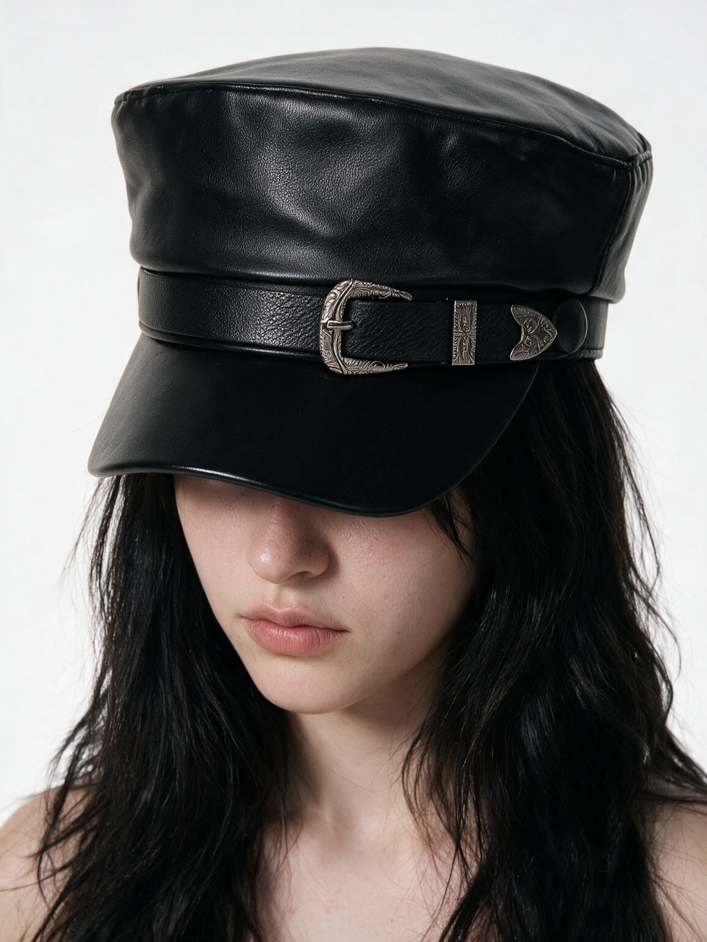 Black leather baker boy cap with a silver buckle band