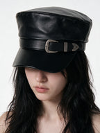 Black leather baker boy cap with a silver buckle band