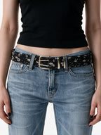 Black belt printed with silver stars and two pin buckles