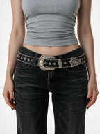 Black western belt with crystals and an engraved silver buckle set