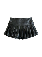 Black pleated faux leather mini skirt with a studded belt