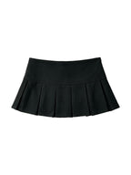 Black pleated mini skirt with silver side buttons