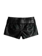 Black faux leather low rise shorts with a buckle belt