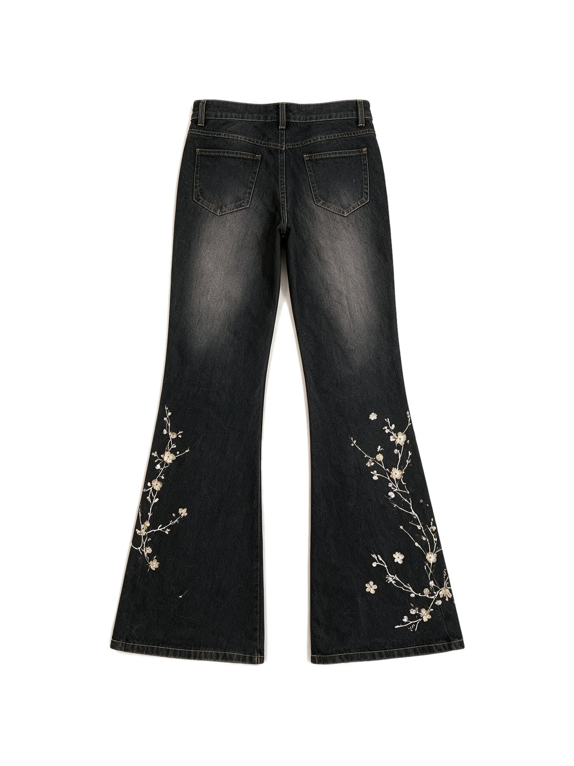 Washed black flare jeans with pale floral embroidery