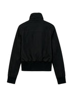 Cropped black bomber jacket with a studded buckled collar
