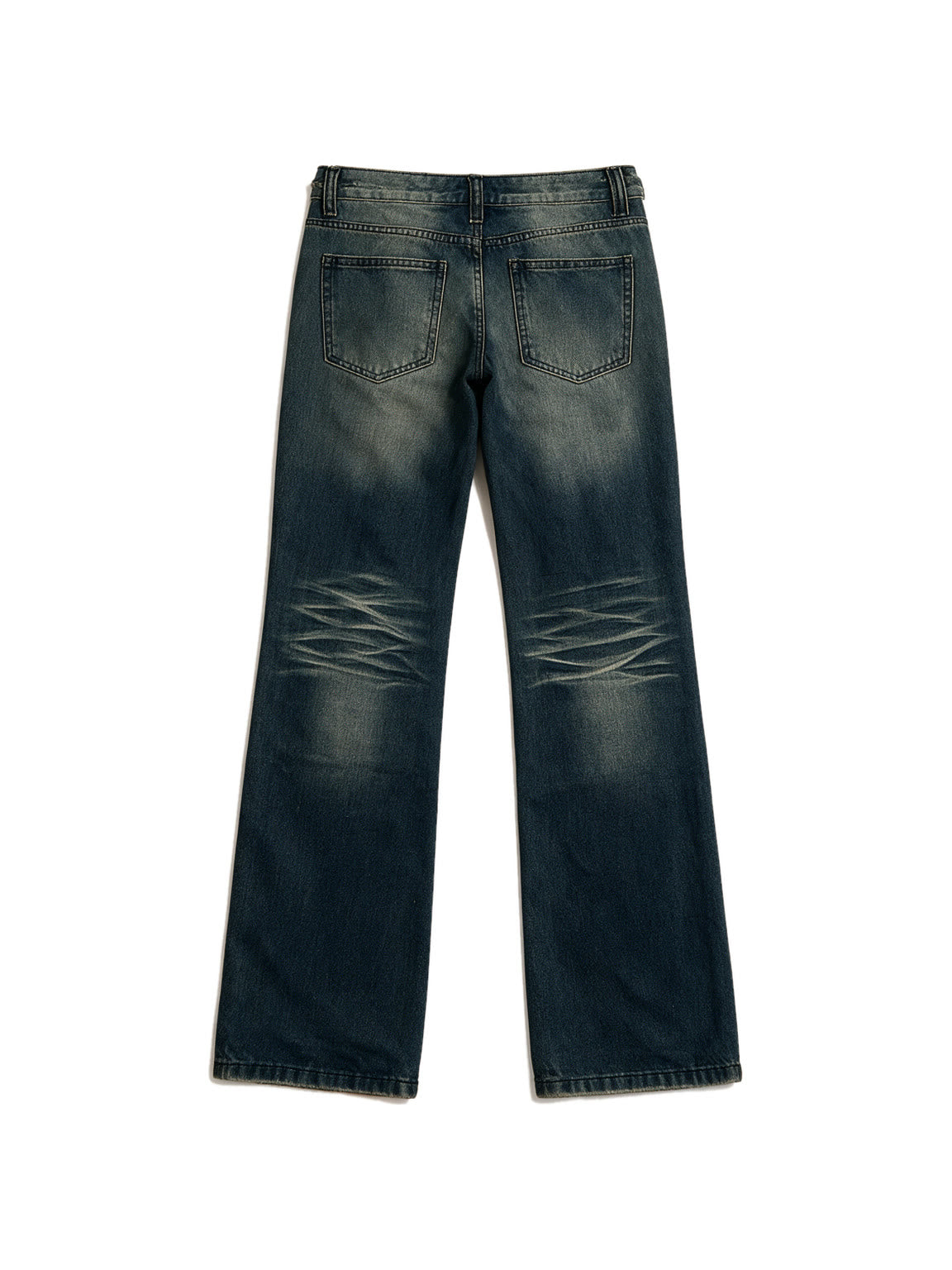 Distressed dark blue jeans with rivet patches