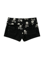 Black shorts with a skull and crossbones printed waistband