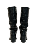 Black slouched knee high platform boots with buckles