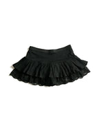 Black ruffle mini skirt with lace trim and satin bows
