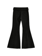Black high waist flare trousers with a studded belt