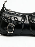 Black leather baguette bag with two buckled front pockets