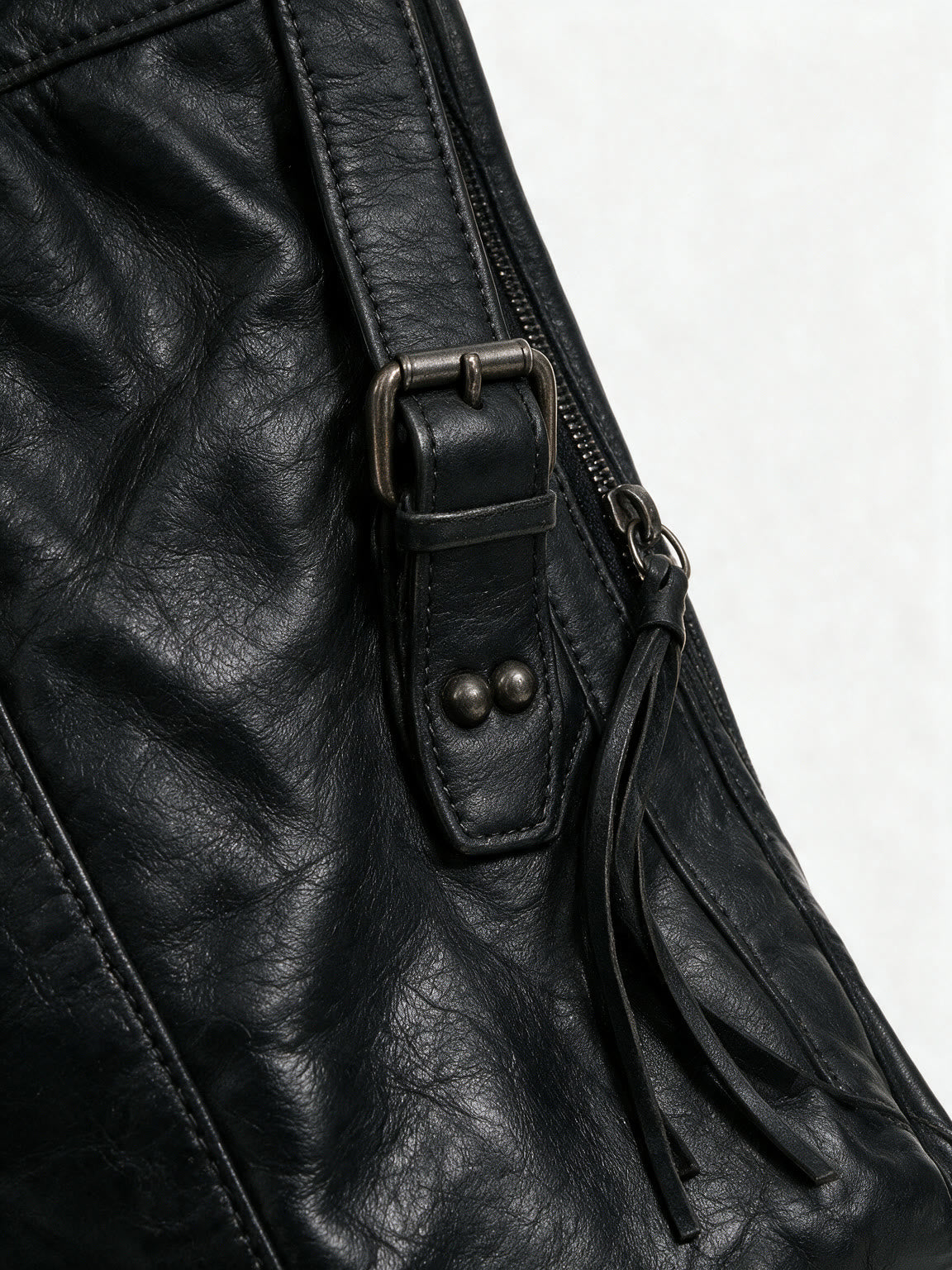 Washed black leather city moto shoulder bag with zip pockets