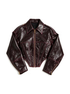 Oxblood red leather jacket with a wide lapel collar