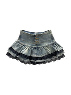 Washed denim tiered mini skirt with black lace trim