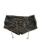 Distressed washed denim micro shorts with a lace up front