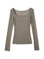 Taupe ribbed long sleeve top with an irregular hem