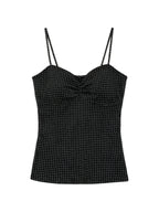Black polka dot cami with a ruched bust