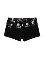 Black shorts with a skull and crossbones printed waistband