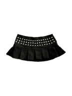 Black pleated mini skirt with a studded yoke