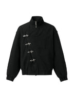Black stand collar jacket with silver toggle clasps