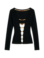 Black long sleeve top with a beaded cut out front