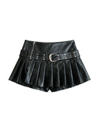Black pleated faux leather mini skirt with a studded belt