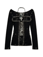 Black long sleeve top with a pinned lace panel and cross prints