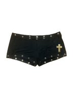 Black micro shorts with grommets and a gold cross