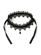 Black lace choker with a teardrop pendant and ribbon ties