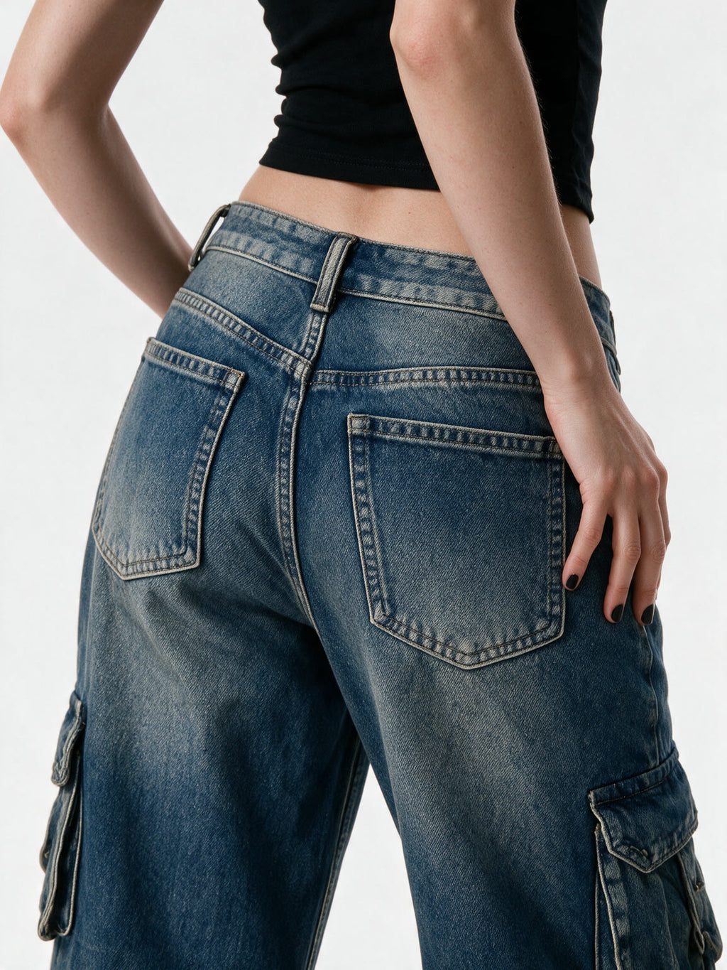 Washed blue cargo flare jeans with thigh pockets
