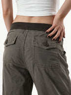 Washed taupe low rise trousers with a lace up waist